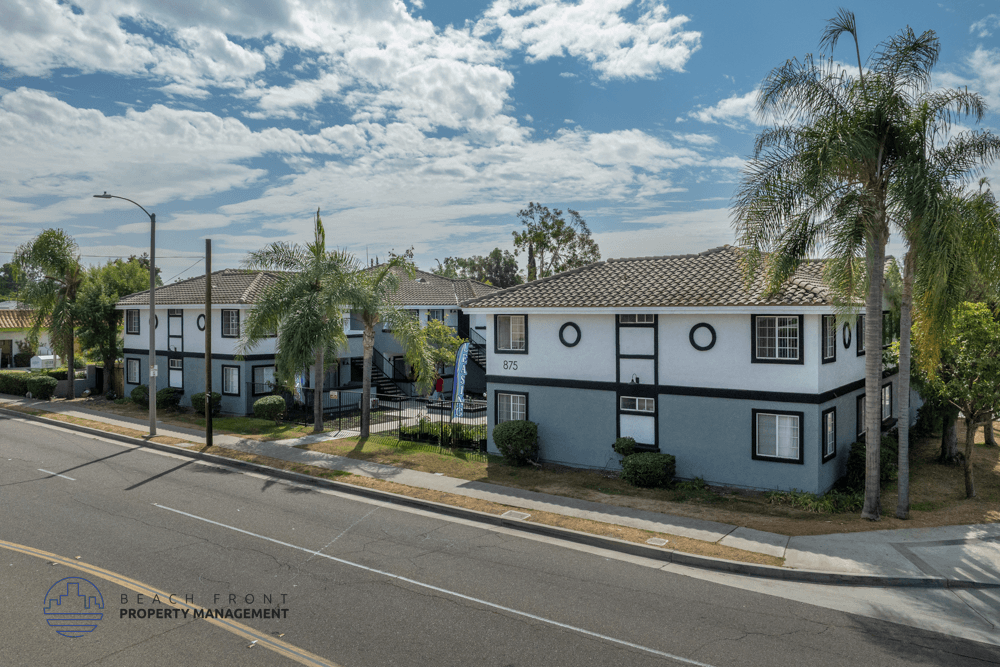 A row of houses with the text "BLACK FRONT PROPERTY MANAGEMENT" on the bottom left.